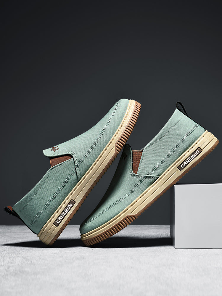 CANEMON LY553 mint green canvas slip-on shoes pair in an angled side view