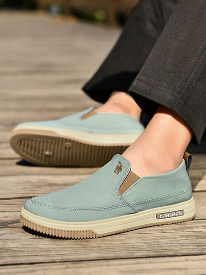 CANEMON LY553 mint green canvas slip-on shoes close-up on-foot view