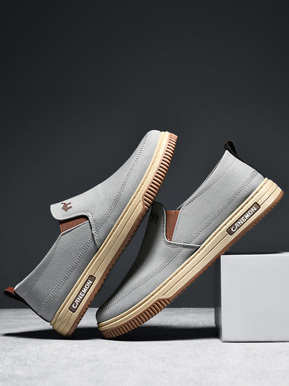 CANEMON LY553 grey canvas slip-on shoes pair in an angled side view