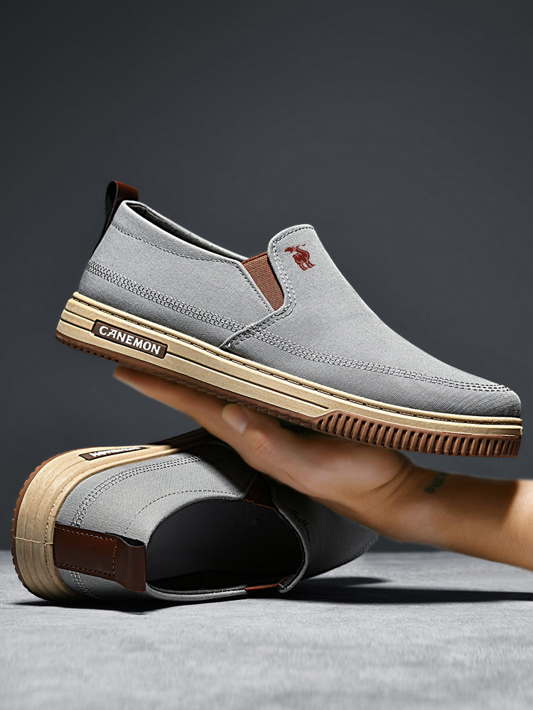 CANEMON LY553 grey canvas slip-on shoes supplier photograph of the shoe flexing by hand