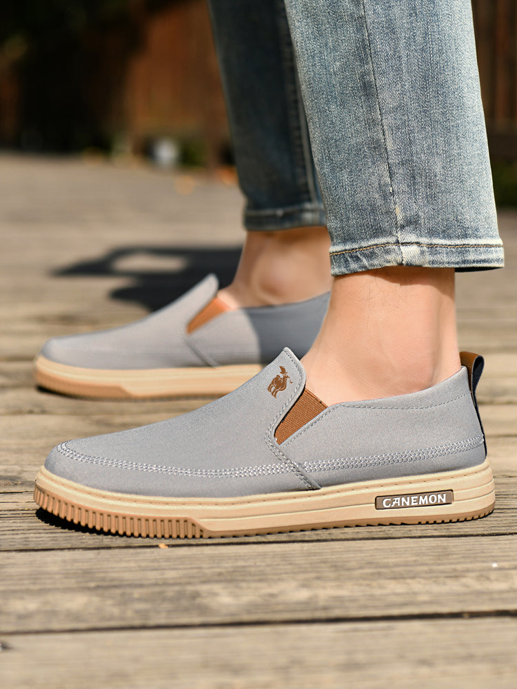 CANEMON LY553 grey canvas slip-on shoes worn with casual trousers